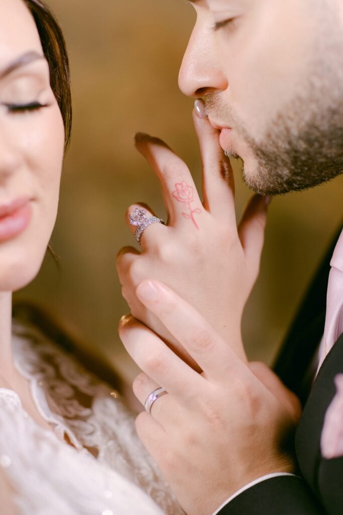 Olivia and Amro in a close, candlelit moment